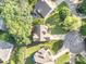 Aerial view of a landscaped home with a spacious lawn and private backyard at 19509 Trintella Ln, Cornelius, NC 28031