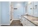 Bathroom features a granite countertop, updated vanity, and tiled walk-in shower at 19509 Trintella Ln, Cornelius, NC 28031