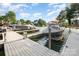 Picturesque view of boat docks on the water, offering convenient waterfront access at 19509 Trintella Ln, Cornelius, NC 28031