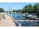A well-maintained boat dock on a calm waterway, perfect for a day of leisure at 21514 Gulfstar Ct, Cornelius, NC 28031