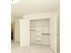 Walk in Closet with white shelving and double doors at 21514 Gulfstar Ct, Cornelius, NC 28031