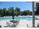 A refreshing community pool with ample seating, perfect for relaxation and socializing at 21514 Gulfstar Ct, Cornelius, NC 28031