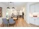 Open-concept kitchen and dining area with hardwood floors and stainless steel appliances at 21514 Gulfstar Ct, Cornelius, NC 28031