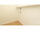 Laundry area with tile flooring, white cabinets, and a utility sink at 21514 Gulfstar Ct, Cornelius, NC 28031
