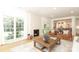 Spacious living room featuring wood floors, fireplace and large windows at 21514 Gulfstar Ct, Cornelius, NC 28031