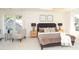 Bright and stylish primary bedroom featuring natural light, and plush decor at 21514 Gulfstar Ct, Cornelius, NC 28031