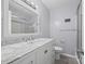 Bathroom featuring white cabinets, a marble countertop, and shower-tub combo at 2178 Tryon Courthouse Rd, Bessemer City, NC 28016
