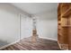 Bedroom features wood-look floors, a closet and access to other rooms at 2178 Tryon Courthouse Rd, Bessemer City, NC 28016