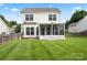 Two-story home featuring a screened in porch, well-maintained lawn, and fenced yard at 2527 Fossil Stone Ln, Fort Mill, SC 29708
