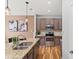 A kitchen featuring granite countertops, stainless steel appliances, and wooden floors at 2527 Fossil Stone Ln, Fort Mill, SC 29708