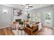 Cozy living room featuring a fireplace, comfortable seating, and contemporary decor for relaxation and entertainment at 2527 Fossil Stone Ln, Fort Mill, SC 29708