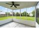 Screened-in patio with a view of a well-maintained backyard at 2527 Fossil Stone Ln, Fort Mill, SC 29708