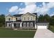 Beautiful two-story home with a three-car garage and professionally landscaped yard at 2541 Mabel Ln, Monroe, NC 28110