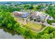 Stunning aerial view of complex with park, amphitheater, green space, and water feature with surrounding neighborhoods at 264 Auburn View Rd, Rock Hill, SC 29730