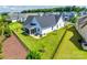 Aerial view of fenced backyard with lush green grass, patio, and screened porch at 264 Auburn View Rd, Rock Hill, SC 29730
