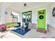 Inviting front porch with stylish seating and a vibrant green door, creating a cozy and welcoming entrance at 264 Auburn View Rd, Rock Hill, SC 29730