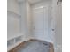 Mud room with coat rack, bench, wooden floor, and neutral paint at 264 Auburn View Rd, Rock Hill, SC 29730