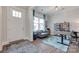 Well-lit home office with a comfortable chair, ample workspace, and a bright window view at 264 Auburn View Rd, Rock Hill, SC 29730