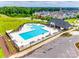 Aerial view of neighborhood pool featuring recreational and lap swimming areas, lounge chairs, and ample patio space at 264 Auburn View Rd, Rock Hill, SC 29730