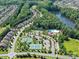 Beautiful community with lake, pool, tennis courts, manicured lawns and mature trees at 2972 Arches Bluff Cir, Lancaster, SC 29720