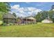 Expansive backyard featuring gazebo and a sprawling lawn, perfect for outdoor gatherings and activities at 321 York Southern Rd, Fort Mill, SC 29715