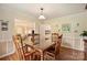 Charming dining room with hardwood floors adjacent to the living room, perfect for entertaining at 321 York Southern Rd, Fort Mill, SC 29715