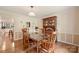 Traditional dining room with hardwood floors and beautiful china cabinet with glass display at 321 York Southern Rd, Fort Mill, SC 29715