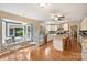 Bright kitchen featuring island seating, stainless appliances, and a cozy breakfast nook at 321 York Southern Rd, Fort Mill, SC 29715
