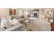 Comfortable living room with a brick fireplace, built-in shelving, and plush seating arrangements at 321 York Southern Rd, Fort Mill, SC 29715