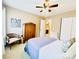 Comfortable bedroom with a large bed, seating area, and closet, all enhanced by natural light from large windows at 4048 Cascade Dr, Gastonia, NC 28056