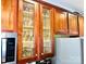 Elegant kitchen cabinets with glass fronts showcase glassware, adding a touch of sophistication to the space at 4048 Cascade Dr, Gastonia, NC 28056