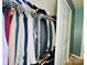 This closet contains a clothing rack with a variety of clothes and shelf with boxes on top at 4048 Cascade Dr, Gastonia, NC 28056