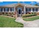 Charming clubhouse showcasing well-maintained landscaping and inviting entryway at 4048 Cascade Dr, Gastonia, NC 28056