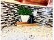 Granite countertops complemented by a decorative plant and stylish backsplash create an inviting kitchen ambiance at 4048 Cascade Dr, Gastonia, NC 28056