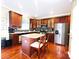 Stylish kitchen with wood cabinets, granite countertops, stainless steel appliances, and a central island at 4048 Cascade Dr, Gastonia, NC 28056