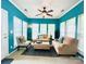 Bright and airy living room with comfortable seating, enhanced by multiple windows and serene decor at 4048 Cascade Dr, Gastonia, NC 28056