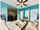 Bright living room features neutral furniture, ceiling fan, and view into dining area at 4048 Cascade Dr, Gastonia, NC 28056