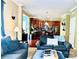 Comfortable living room leading to the kitchen with stainless steel appliances and wooden cabinets at 4048 Cascade Dr, Gastonia, NC 28056