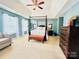 Light filled main bedroom with tray ceiling, four poster bed and lots of space at 4048 Cascade Dr, Gastonia, NC 28056