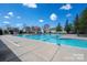 Large, sparkling community swimming pool with clear blue water and ample deck space at 4048 Cascade Dr, Gastonia, NC 28056