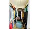 Walk-in closet with clothing racks, shelves, shoe rack and a blue ottoman at 4048 Cascade Dr, Gastonia, NC 28056