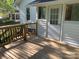 Newly constructed back deck with decorative railing and view of backyard at 419 W 8Th St, Newton, NC 28658