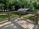 Newly constructed back deck with decorative railing and view of shed at 419 W 8Th St, Newton, NC 28658