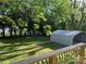 View from the deck to the backyard with carport and shed at 419 W 8Th St, Newton, NC 28658
