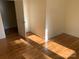 Bedroom with hardwood floors and baseboard trim at 419 W 8Th St, Newton, NC 28658