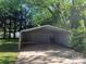 View of the metal carport in the back yard on a sunny day at 419 W 8Th St, Newton, NC 28658