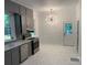 Kitchen featuring gray cabinets, stainless steel appliances and adjacent dining area at 419 W 8Th St, Newton, NC 28658