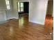 Bright living room with hardwood floors, a fireplace, and ample natural light at 419 W 8Th St, Newton, NC 28658