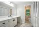 Bathroom vanity featuring lots of counter space, black fixtures, and lots of storage at 4323 Crow Rd, Monroe, NC 28112