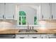 Close up on modern sink and window view at 4323 Crow Rd, Monroe, NC 28112